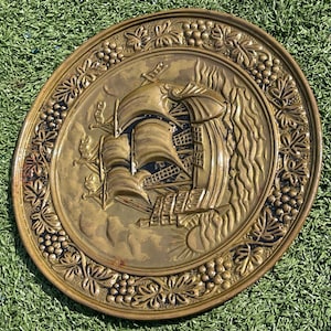 Vintage Brass Embossed Wall Plate – 10” Sailing Ship with Grapevine Border