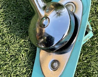 Vintage Swing-A-Way wall-mounted can opener in beautiful 1950s–60s turquoise enamel with chrome-tone mechanism and matching turquoise rotary