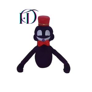 Peut inclure: Une peluche avec un corps violet foncé, de longs bras et un visage souriant. Elle porte un nœud papillon rouge et un haut-de-forme rouge avec une bande dorée. Les lettres "FD" sont dans le coin supérieur gauche.