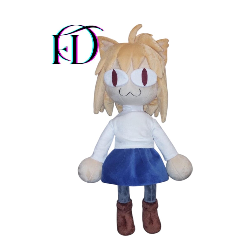 May include: A plush doll of a cat-like character with tan fur, red eyes, and a white shirt, blue skirt, and brown boots. The doll has large, round hands and feet. The letters "FD" are in the upper left corner.