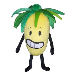 May include: A plush toy shaped like a smiling corn cob with black arms and legs. The corn is yellow with a stitched face and a green leafy top. The toy is standing against a white background.