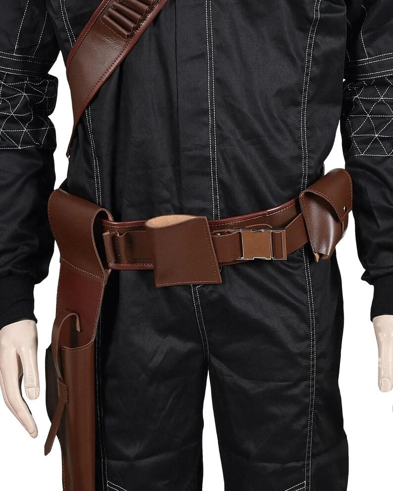 May include: A brown leather gun belt with a holster, pouches, and a cartridge holder. The belt is worn over a black jumpsuit. The belt has a rectangular buckle and is designed for a costume or cosplay.
