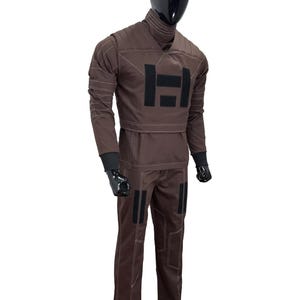 May include: Brown jumpsuit with black accents and white stitching. The outfit features a high collar, long sleeves, and a large black "H" emblem on the chest. The pants have black patches and the mannequin wears black gloves.