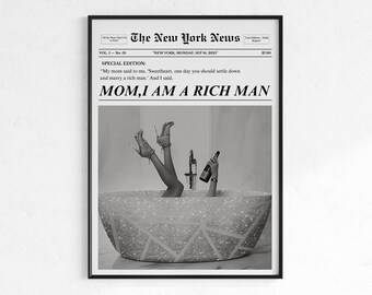 May include: Black and white framed print featuring a mock newspaper front page. The headline reads "MOM, I AM A RICH MAN." The image shows legs in high heels emerging from a sparkling bathtub, with a hand holding a bottle.