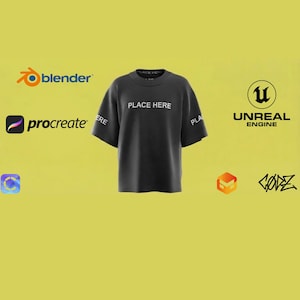 Op de afbeelding: Een donkergrijs T-shirt met korte mouwen en een ronde hals. De tekst "PLACE HERE" is in het wit gedrukt op de borst en op beide mouwen. Het shirt is omringd door diverse softwarelogo's, waaronder Blender, Procreate en Unreal Engine.