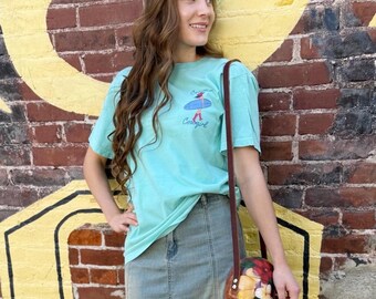 Camiseta vaquera costera con colores cómodos - Camiseta con gráfico country western - Camiseta playera extragrande con gráfico