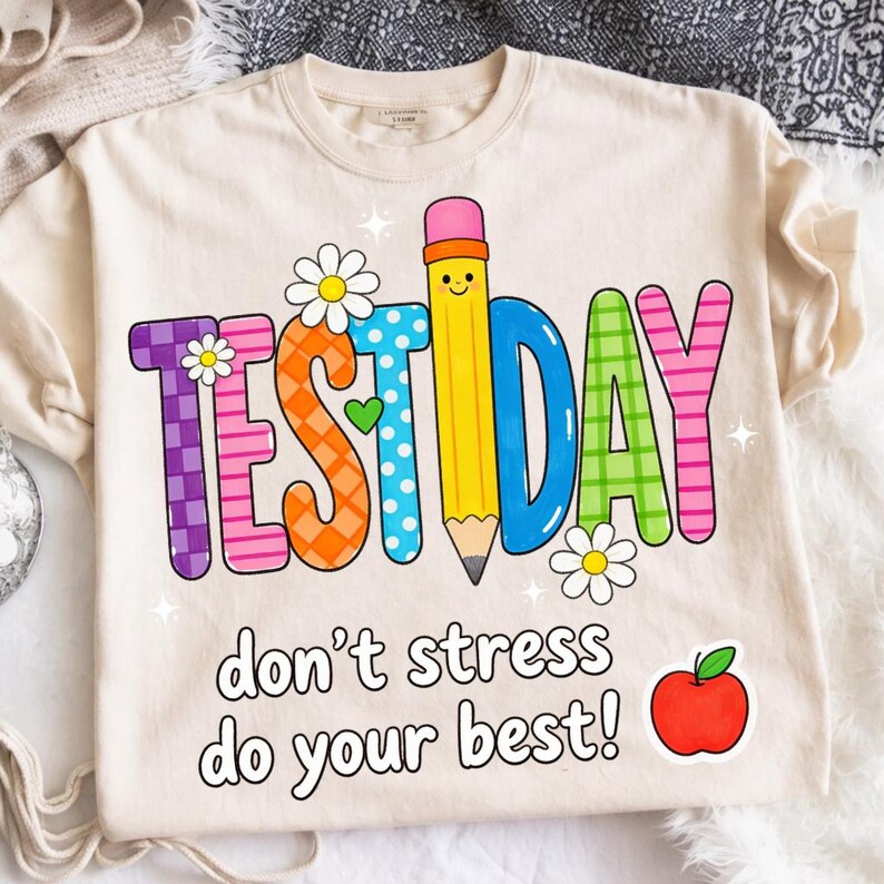 May include: A white ceramic mug with a black handle and the text "But First, Coffee" in a bold, black font. The mug is set against a blurred background, suggesting a cozy setting.