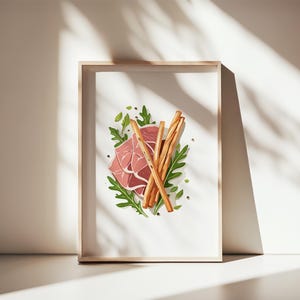 May include: A framed illustration featuring a still life of food. The artwork depicts a piece of pink meat, surrounded by green herbs, black peppercorns, and several breadsticks. The frame is made of light-colored wood.