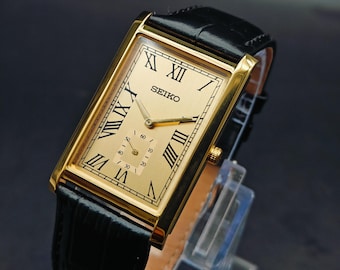 SEIKO シャリオ メンズ 腕時計 ゴールド 80's ヴィンテージ タンク Seiko Tank Circa 1995 Gold Plated Gold Dial Black Band Super