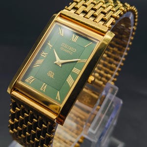 Vintage Seiko Slim Tank Quartz Watch: Gold Plated Black Face