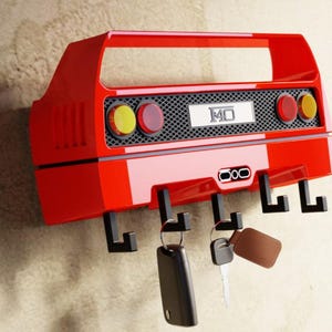 Llavero de pared con forma de coche