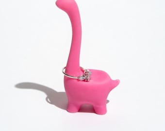 Soporte para anillos con forma de dinosaurio impreso en 3D