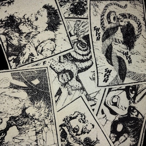 May include: A collection of black and white graphic patches with various illustrations. The patches feature detailed drawings of figures in distress, monsters, and abstract designs. Some patches have text, including the word "SHISH". The overall aesthetic is reminiscent of comic book art.