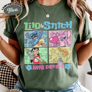 May include: Moss green t-shirt with a graphic of Lilo & Stitch characters in four panels. The text "Lilo & Stitch" is above the panels, and "ALOHA EVERYONE" is below. The shirt has a Comfort Colors label.
