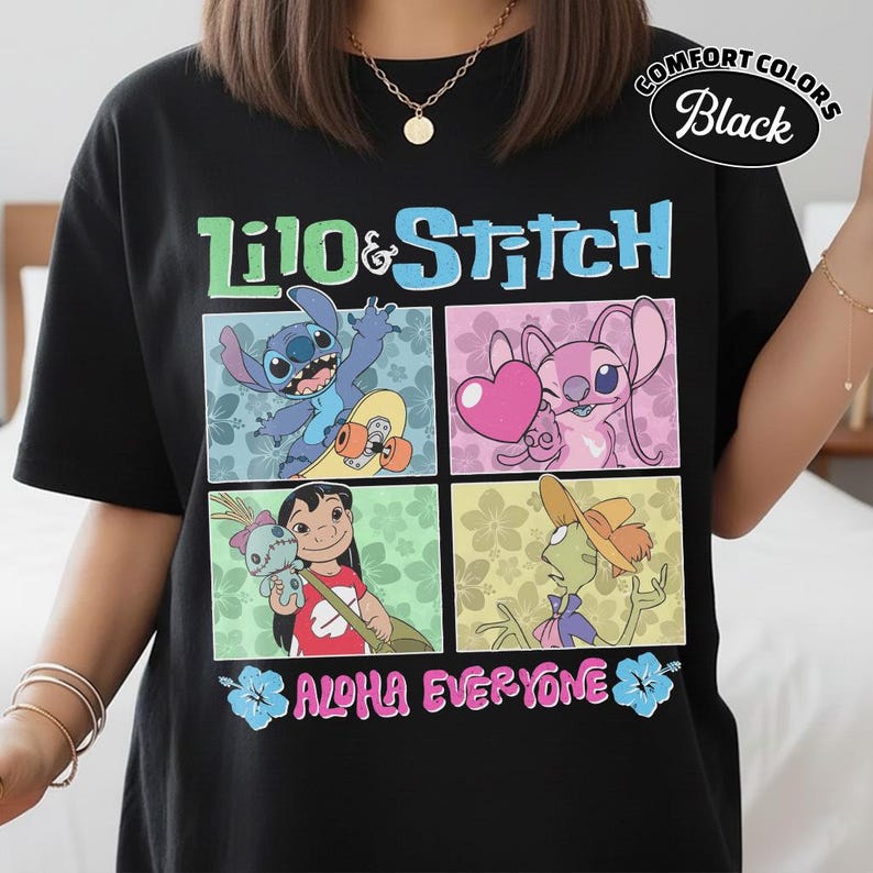 May include: Black t-shirt with a vibrant graphic of Lilo & Stitch characters. The design includes the text "Lilo & Stitch" and "ALOHA EVERYONE". The shirt is labelled "Comfort Colors Black".