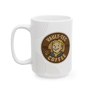 May include: White ceramic coffee mug featuring the Vault-Tec Coffee logo. The logo is a brown circle with a smiling cartoon character holding a coffee cup. The words "VAULT-TEC COFFEE" are printed on the mug.