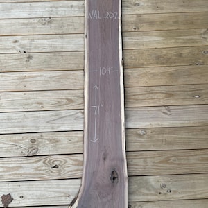 Kiln dried live edge Black Walnut slab. Surfaced (planned) on both sides.