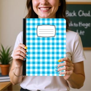May include: A rectangular notebook featuring a bright blue and white checkered pattern across the cover. The notebook has a solid black spine and a white rectangular label with four horizontal lines centered on the front for writing a title.