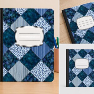 May include: A notebook with a black spine and a cover featuring a blue and white diamond-patterned quilt design. The pattern includes squares with floral, striped, and solid dark blue textures. A white rectangular label with lines is centered.