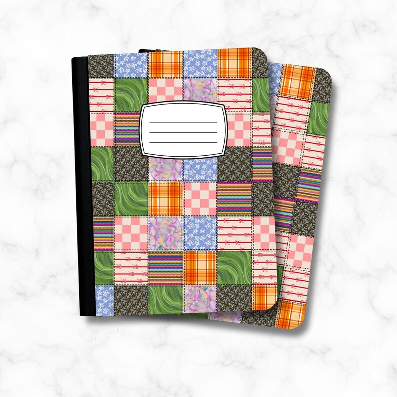 May include: A notebook featuring a patchwork design of various squares in colors including orange, green, pink, blue, and brown. The cover displays a white rectangular label with four horizontal lines for writing, set against a black spine.