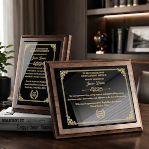 May include: Two rectangular wooden plaques with dark brown frames and black glass centres. Each plaque features gold-coloured decorative borders and text that reads In Recognition of Outstanding Service, presented to Javier Limon, with dates and logo placeholders.