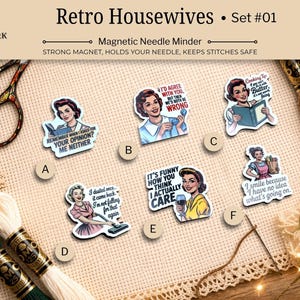 May include: Set of six "Retro Housewives" magnetic needle minders with vintage-style illustrations and humorous quotes. Includes embroidery floss, scissors, and a needle on a neutral fabric background.