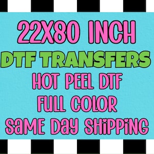 May include: A teal background with the text "22X80 INCH DTF TRANSFERS HOT PEEL DTF FULL COLOR". The text is in pink and green, with a black and white checkered border.