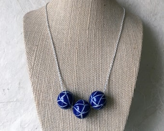 Deep blue ceramic ball necklace