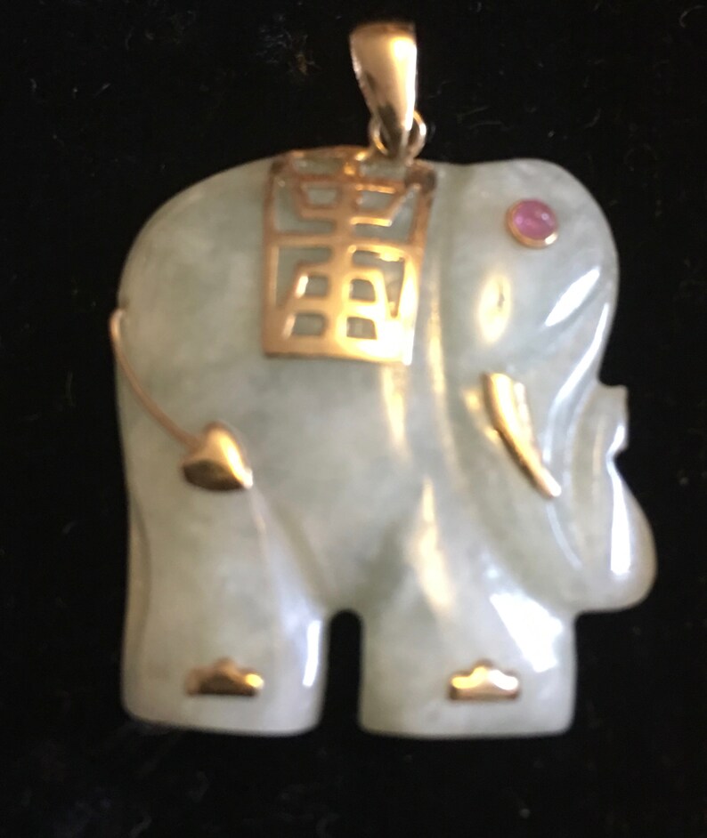 Green Jade Sculptured Elephant pendant with 14K yellow gold accents and amethyst eye VJSE