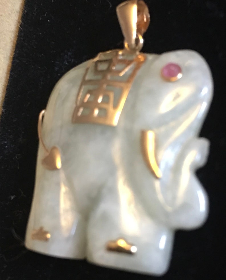 Green Jade Sculptured Elephant pendant with 14K yellow gold accents and amethyst eye VJSE