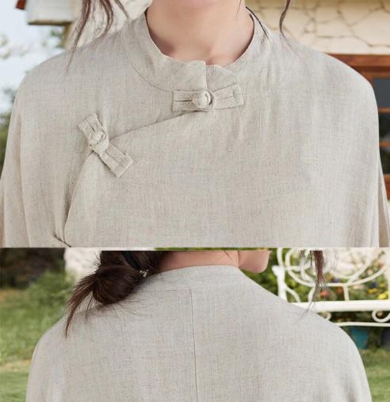 May include: A light beige linen shirt with a mandarin collar and a unique button closure. The shirt features a simple, elegant design with a relaxed fit. The fabric has a textured appearance, suggesting a natural fiber.