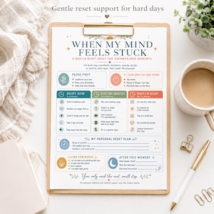 May include: A clipboard holding a printed wellness sheet titled When My Mind Feels Stuck, featuring sections for grounding techniques, reset plans, and kind reminders with colorful icons, text, and fillable lines for personal reflection.
