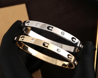 希少なティファニー 18Kゴールド＆シルバー フック＆アイ バングル