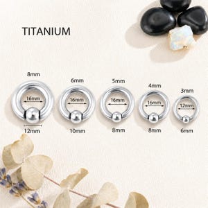 May include: Five silver-colored titanium captive bead rings arranged in a row. Each ring features a central ball and is labeled with specific measurements, including outer diameters of 12mm, 10mm, 8mm, 8mm, and 6mm, and inner diameters of 16mm or 12mm.