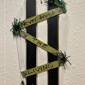Never Trust the Living Beetlejuice-Inspired Wall Coffin