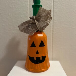 Halloween Jack-O’-Lantern Wine Bottle Decor with Burlap Bow