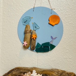 Driftwood, shell, and river rock painted Wall Decor