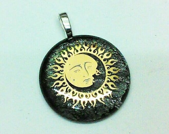 Golden Sun and Moon, 22ct gold image on dichroic glass pendant.