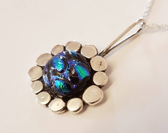 Dichroic glass and sterling silver pendant.