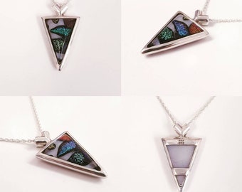 triangular dichroic glass pendant  with sterling silver surround.