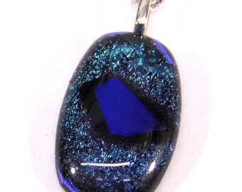 Dichroic glass fashion pendant.