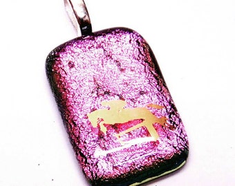 Pink dichroic glass pendant.