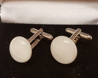 White wedding cuff links.