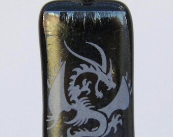 white dragon on special black glass pendant.