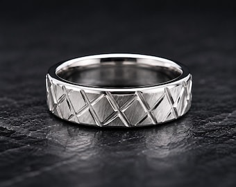 Anillo de plata de ley con diseño geométrico tallado a mano, brazalete moderno unisex que llama la atención.