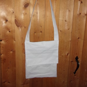 White cotton canvas haversack.