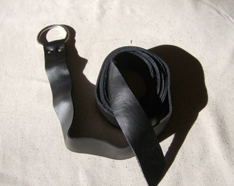 Black leather ring belt made of top grade leather of a supple weight for a nice tie.  72 - 90 inches long