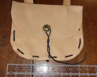 rustic leather pouch with button closure
