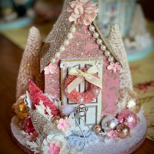Pink Christmas glitter house with sleigh