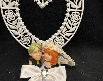 Adorable Hermione Granger & Ron Weasley from Harry Potter Wedding Cake Topper bride Groom top cake. Magic